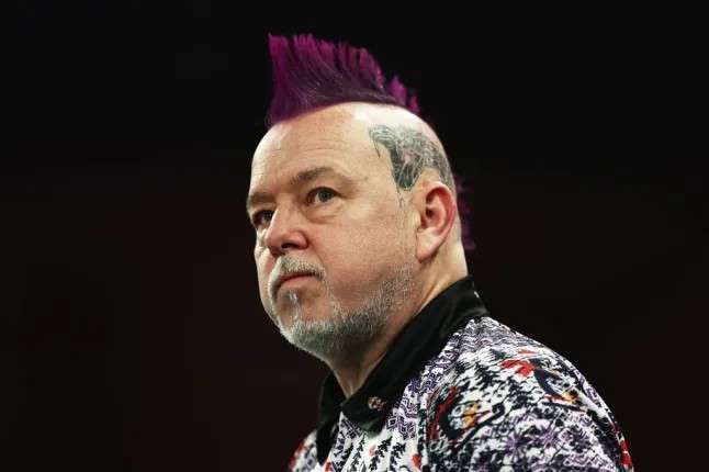 🐍 He's done it! Peter Wright…